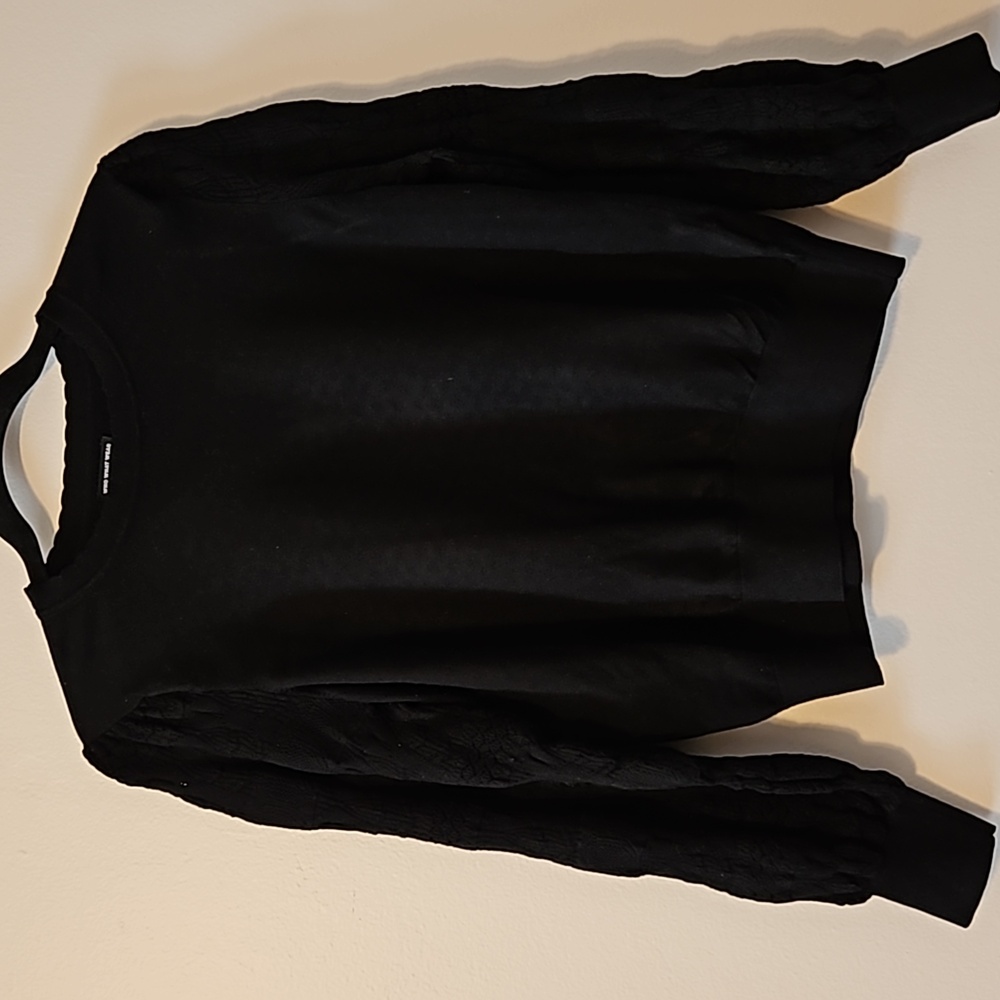 Whowhatwear Black puff sleeve sweater.